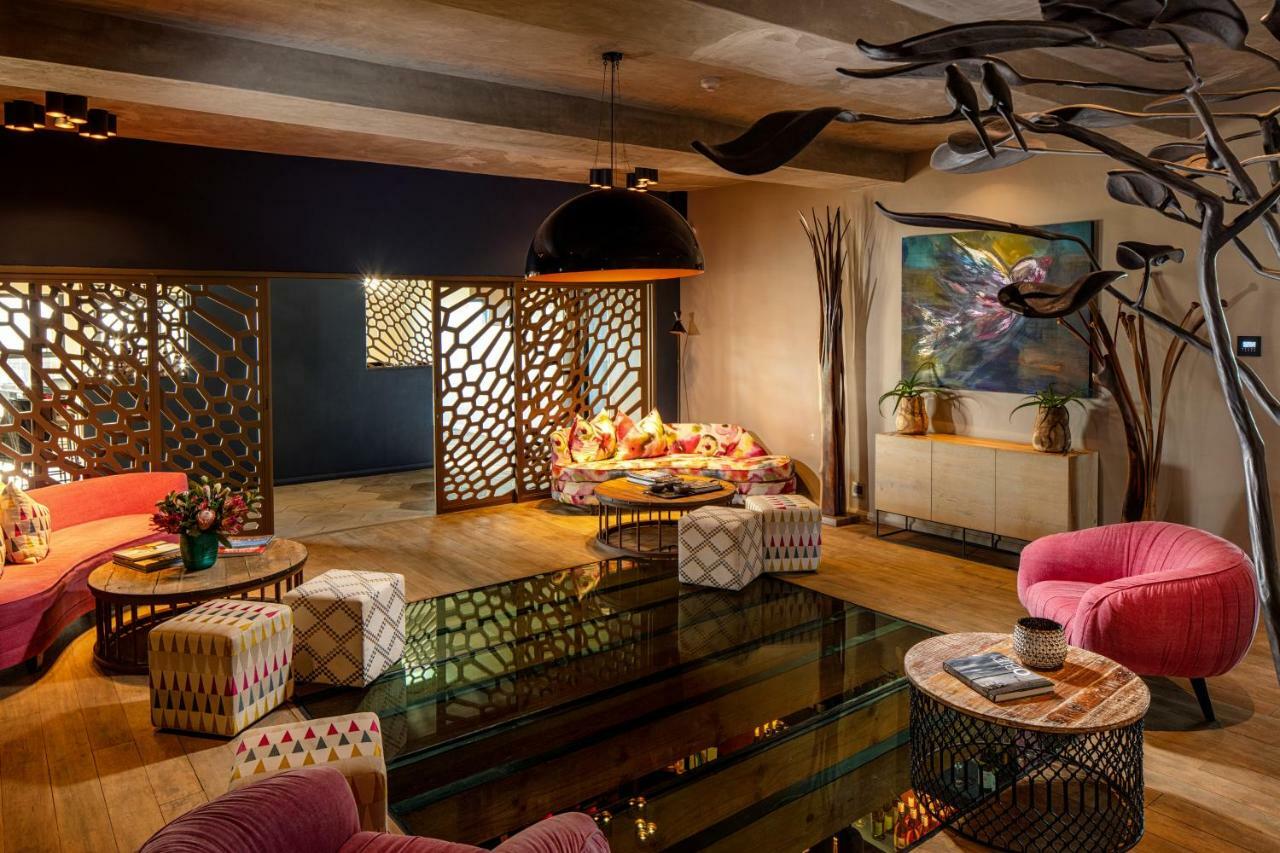 Sky Villa Boutique Hotel By Raw Africa Collection Плеттенберг-Бей Экстерьер фото The interior of the restaurant
